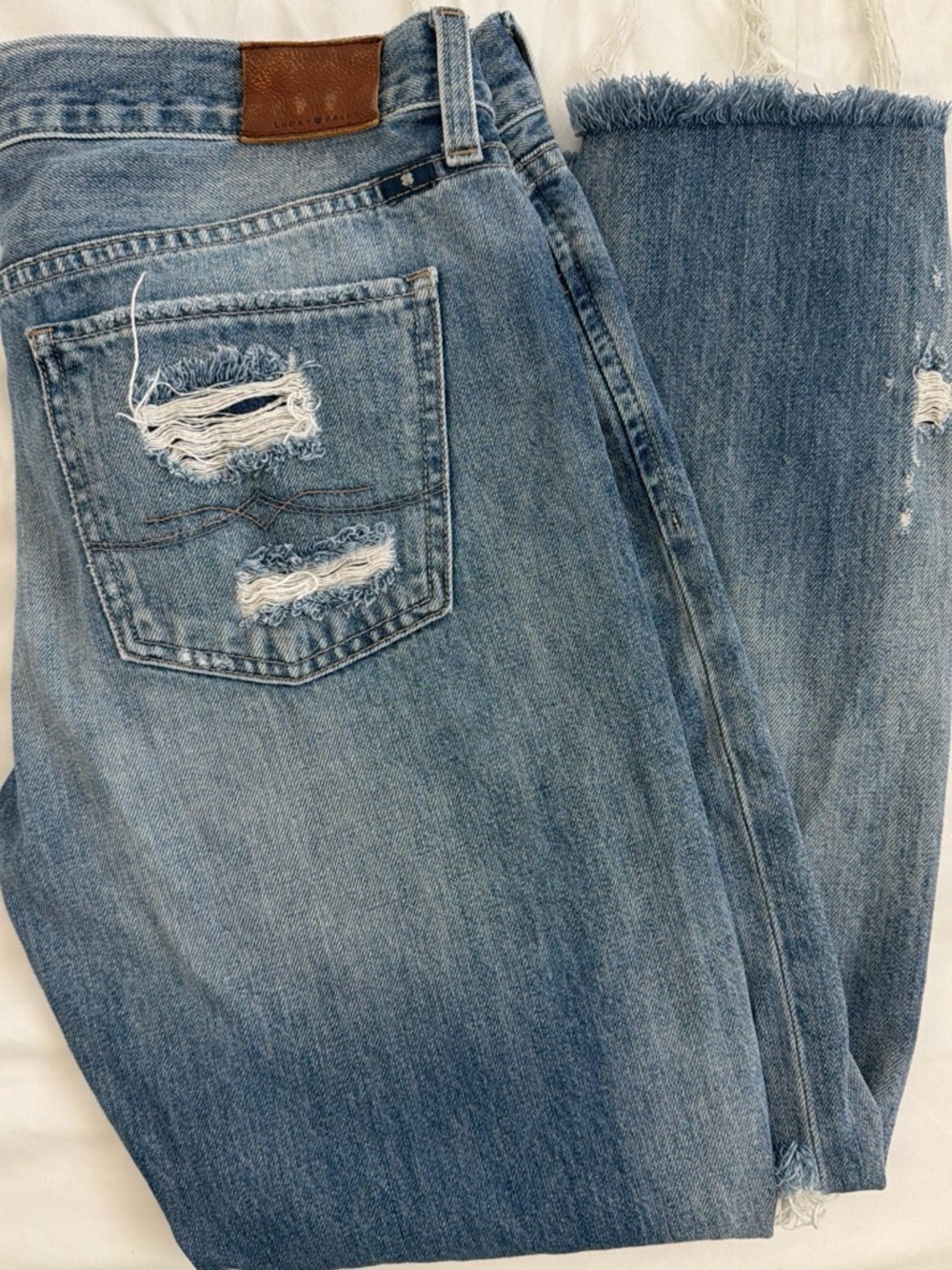 Lucky Brand Light Blue Straight-Leg Jeans with Frayed Hem